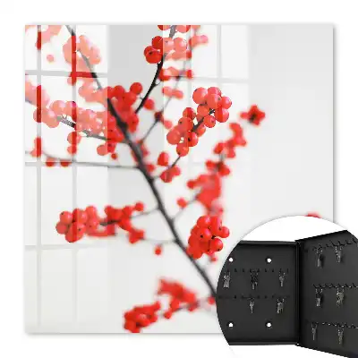 Key box for home Red berries in the light background