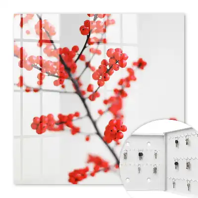 Key box for home Red berries in the light background