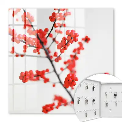 Key box for home Red berries in the light background