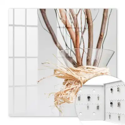 Wall mounted key cabinet Branches in a vase with beige string