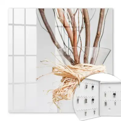 Wall mounted key cabinet Branches in a vase with beige string