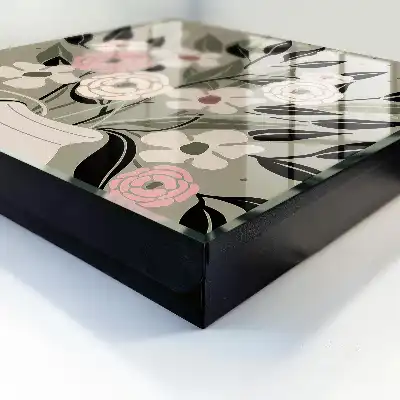 Wall mounted key box Floral composition with a pastel background