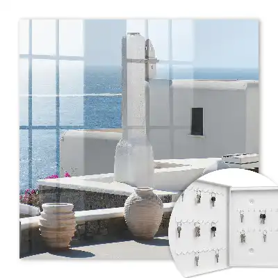 Wall mounted key box featuring Greece white houses by the sea