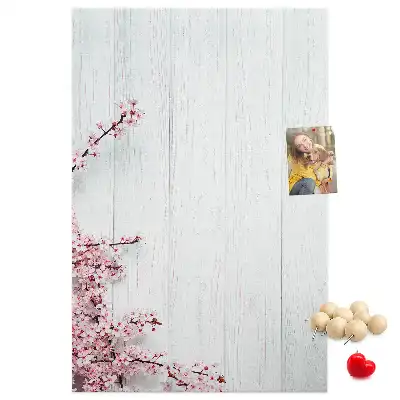 Floral pattern cork note board on wood