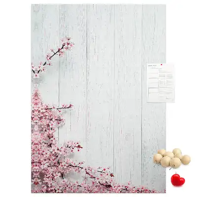 Floral pattern cork note board on wood