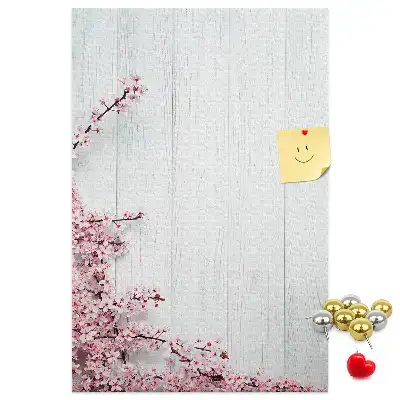 Floral pattern cork note board on wood