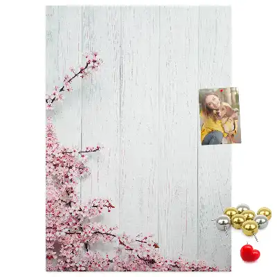 Floral pattern cork note board on wood