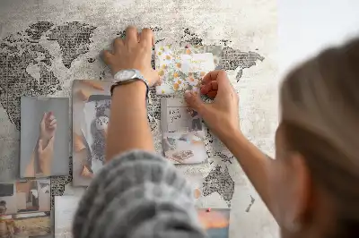 Cork memo board with newspaper world map print