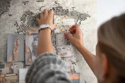 Cork memo board with newspaper world map print