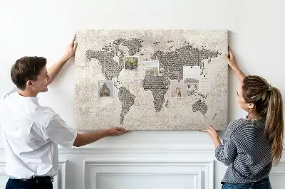 Cork memo board with newspaper world map print
