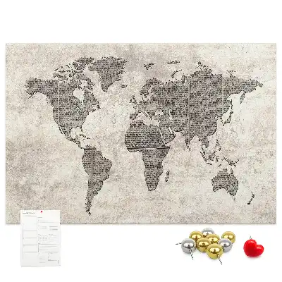 Cork memo board with newspaper world map print