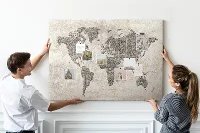 Cork memo board with newspaper world map print