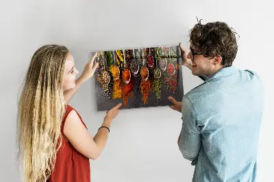 Magnetic board with spices on spoons design