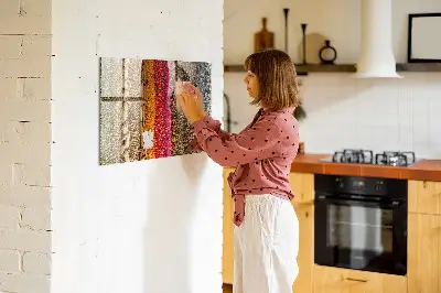 Magnetic glass dry erase board featuring a spice rack design