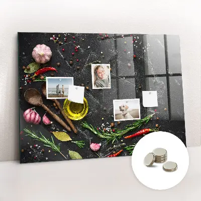 Magnetic glass dry erase board featuring spices on the counter