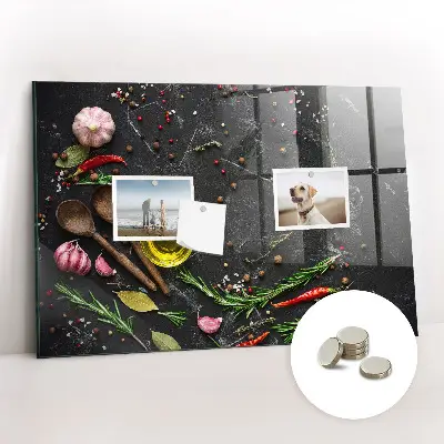 Magnetic glass dry erase board featuring spices on the counter