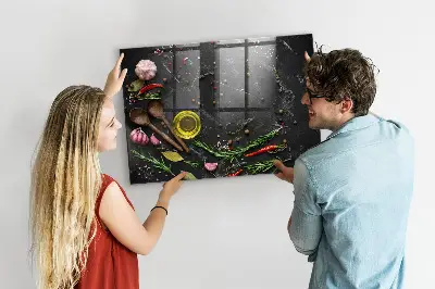 Magnetic glass dry erase board featuring spices on the counter