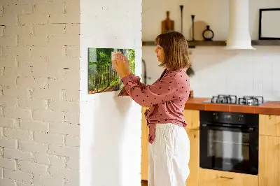 Magnetic glass dry erase board featuring a forest sunrise