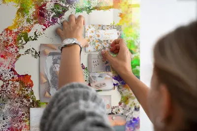 Magnetic wall board with a watercolor world map