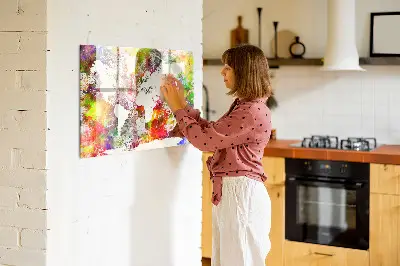 Magnetic wall board with a watercolor world map