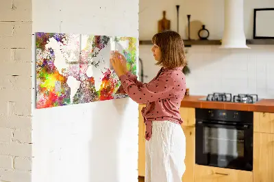 Magnetic wall board with a watercolor world map