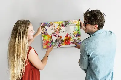 Magnetic wall board with a watercolor world map