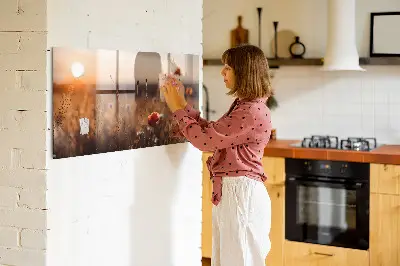 Magnetic glass dry erase board featuring a sunrise field design