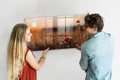 Magnetic glass dry erase board featuring a sunrise field design