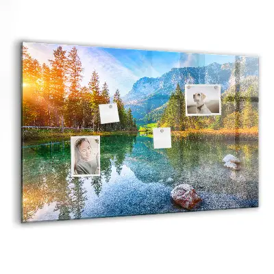 Magnetic wall board featuring a river and mountain landscape
