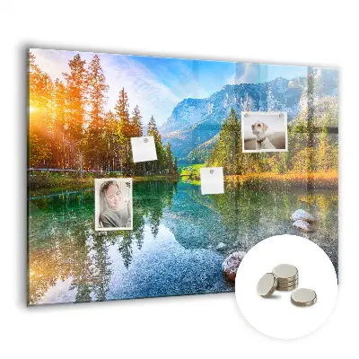 Magnetic wall board featuring a river and mountain landscape