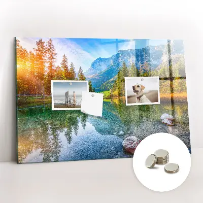 Magnetic wall board featuring a river and mountain landscape