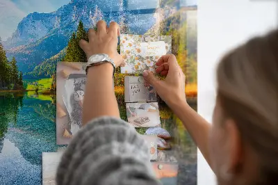 Magnetic wall board featuring a river and mountain landscape