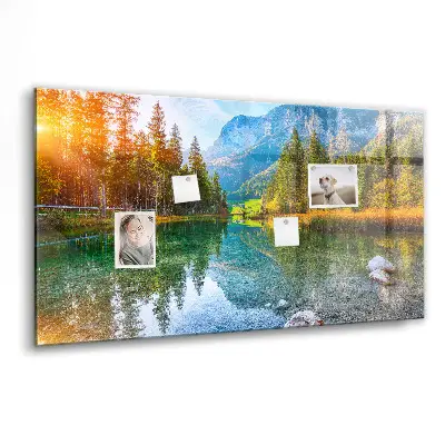 Magnetic wall board featuring a river and mountain landscape