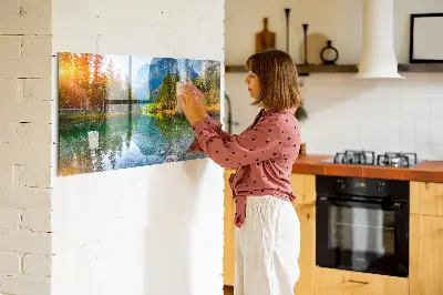 Magnetic wall board featuring a river and mountain landscape