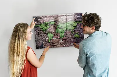 Magnetic glass dry erase board featuring a brick world map design