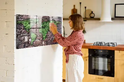Magnetic glass dry erase board featuring a brick world map design