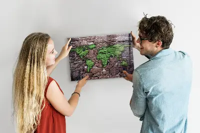 Magnetic glass dry erase board featuring a brick world map design