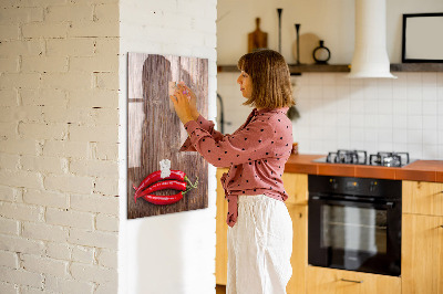 Magnetic board for drawing drawing Pepper on board