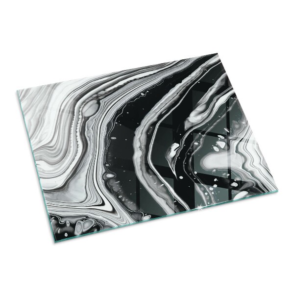 Glass hearth pads with abstract motifs
